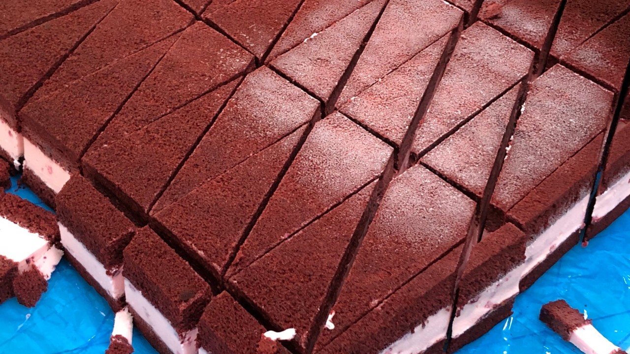 Cutting icecream cake into triangles