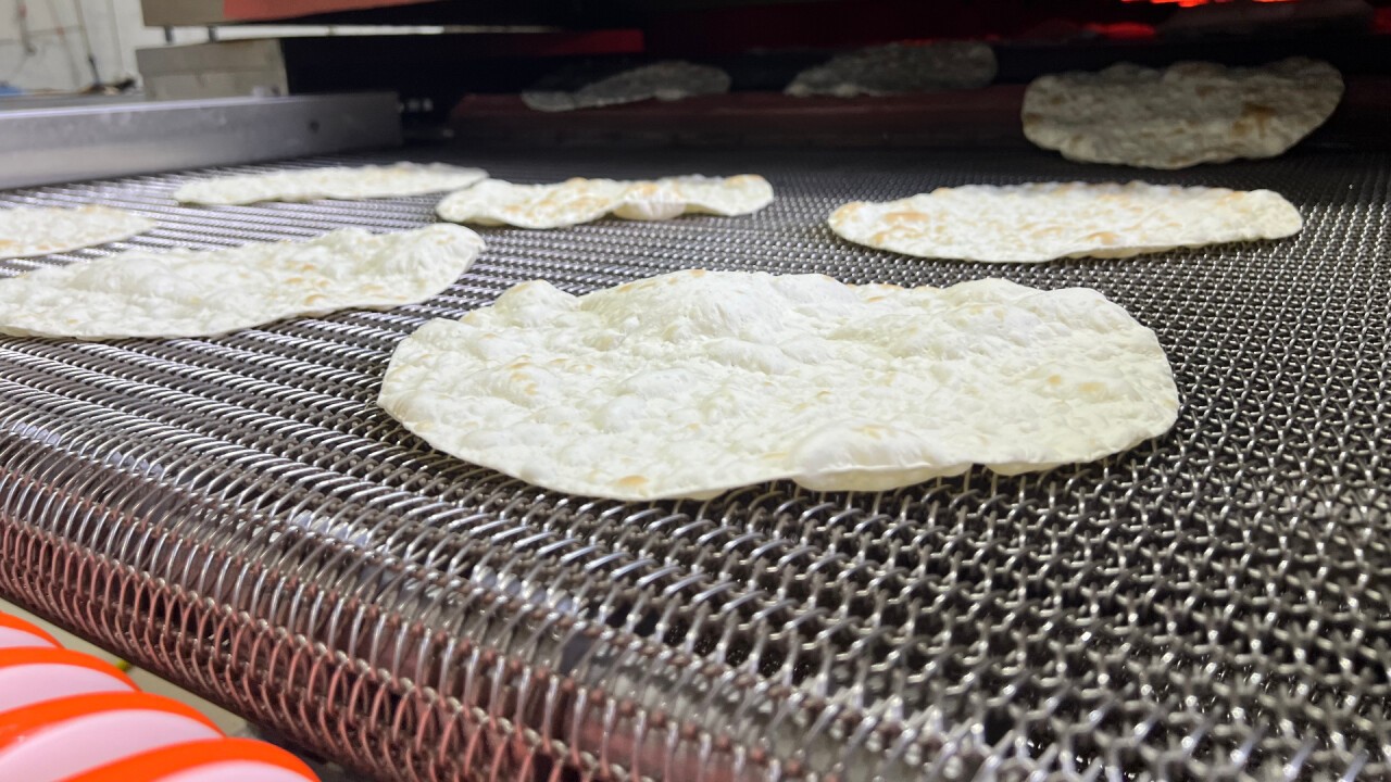 Perfectly baked lavash in progress—consistent texture, quality, and efficiency at scale.