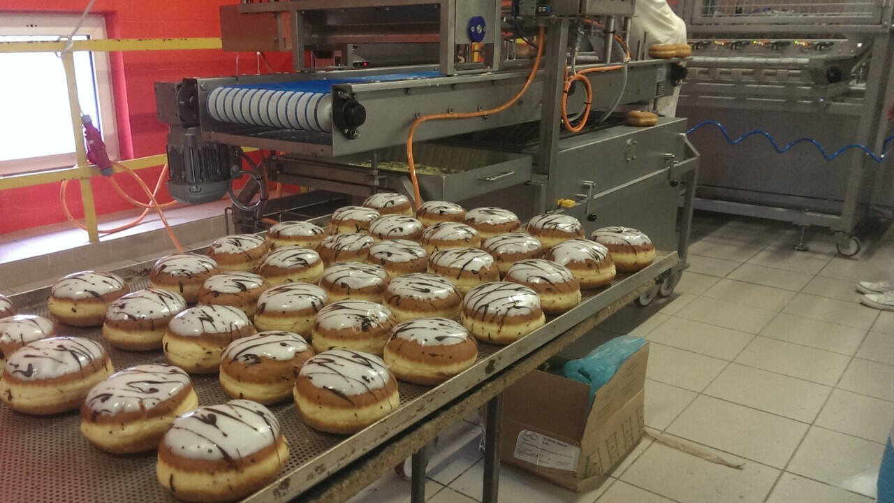 Dipping and decorating doughnuts