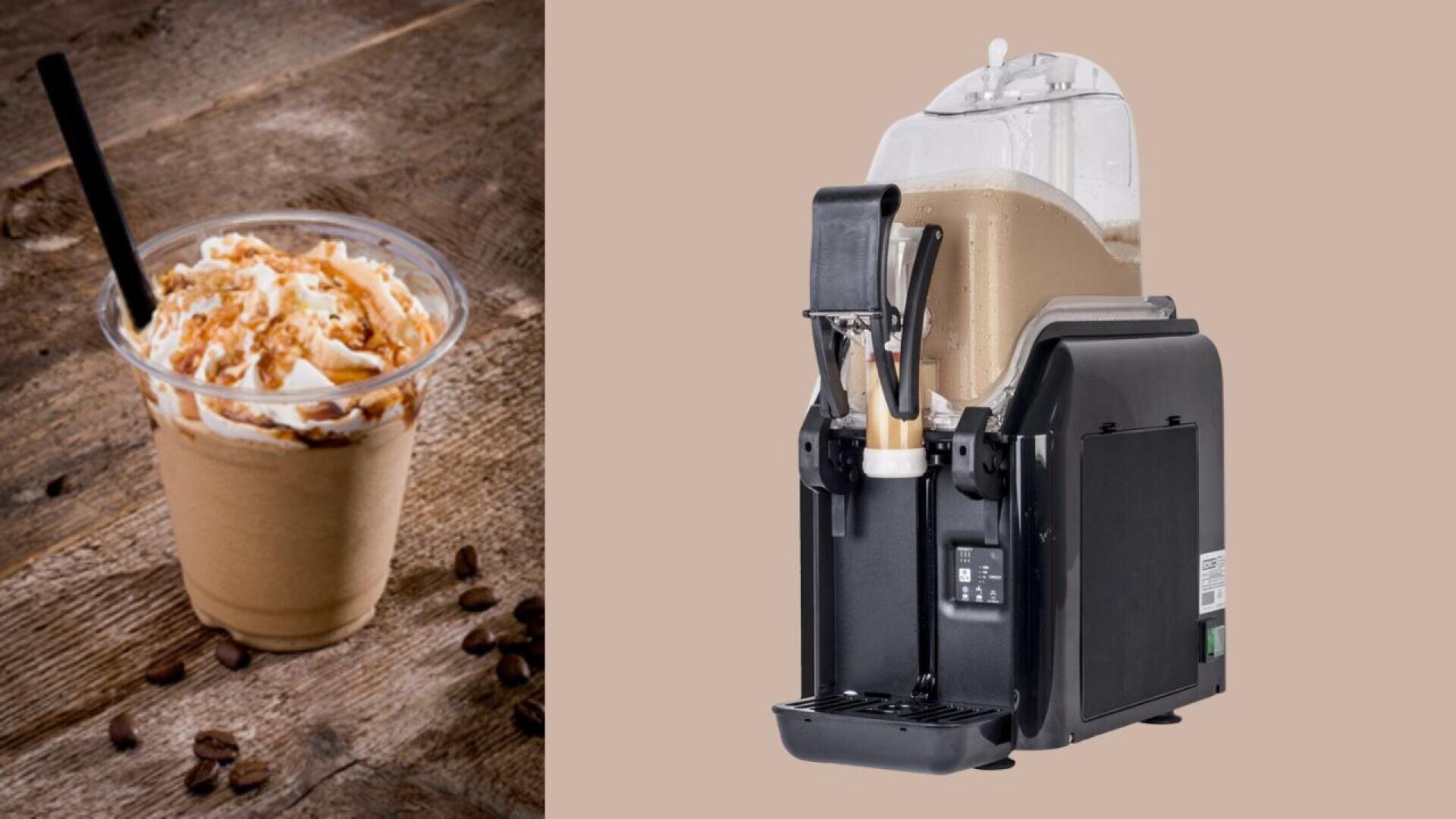 A plastic cup of blended iced coffee with whipped cream and caramel drizzle sits on a wooden surface beside a commercial frozen coffee machine against a beige background.