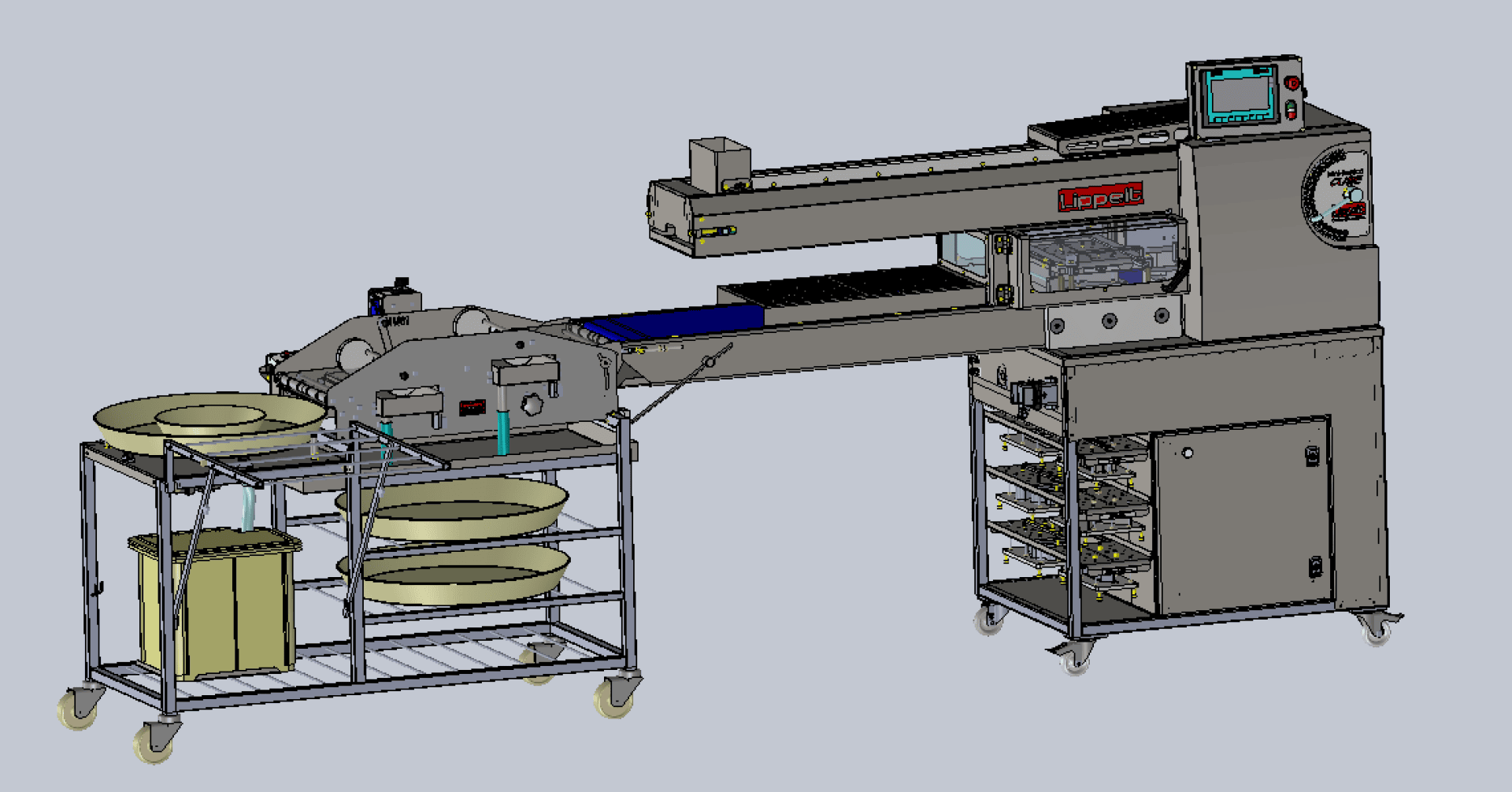 A commercial food processing machine with a conveyor belt, control panel, and metal carts holding several round trays and containers, designed for automated production or packaging.