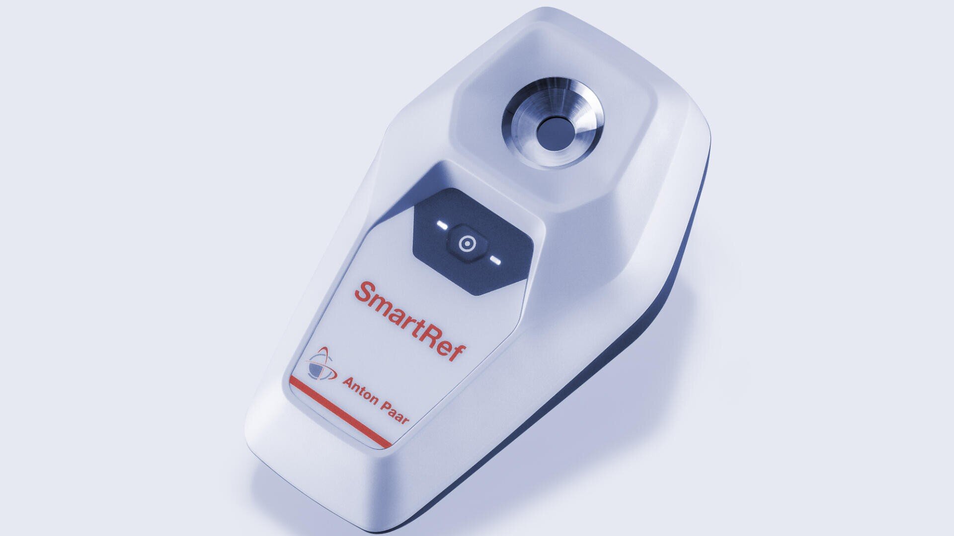 A white digital device labeled SmartRef by Anton Paar, featuring a metallic lens or sensor at the top and a small control panel with two buttons below the lens.