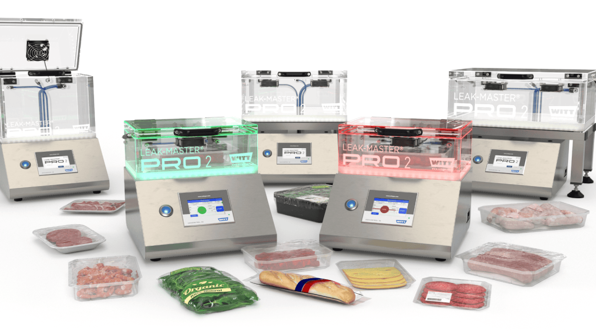 A group of vacuum leak testers labeled LEAK-MASTER PRO2 are surrounded by various vacuum-sealed food items, including meat, cheese, leafy greens, and a baguette, set against a white background.
