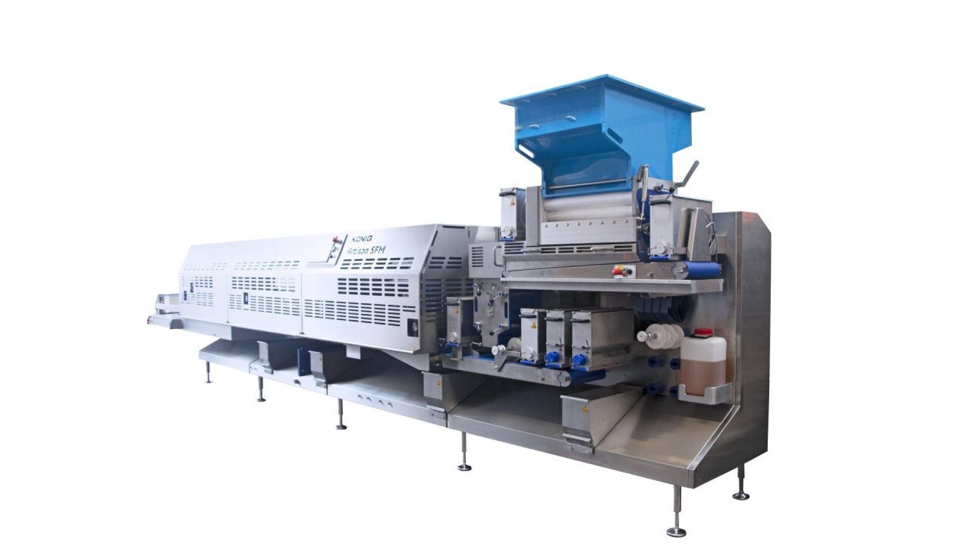 A large, industrial stainless steel food processing machine with various compartments, conveyor belts, and a blue hopper on top, designed for automated food production, set against a white background.