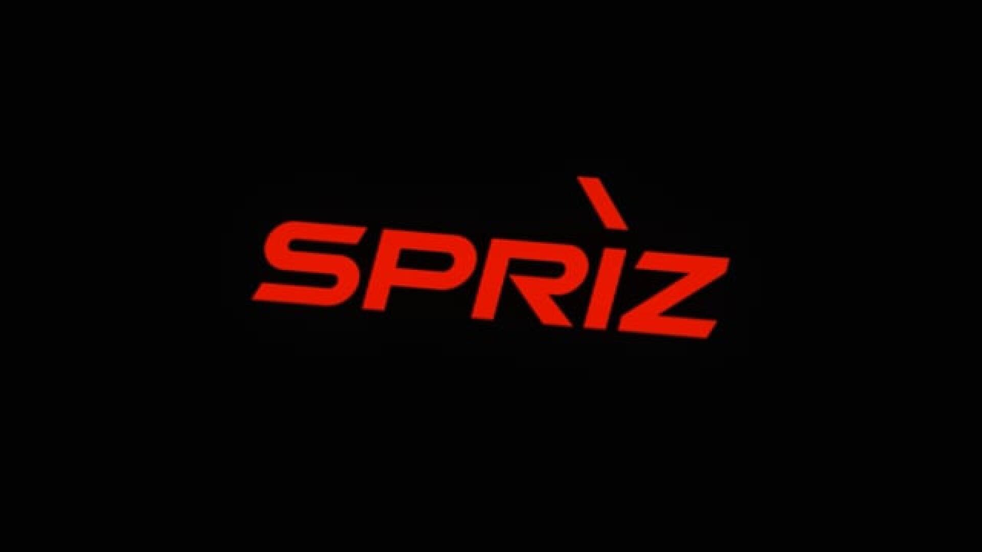 Das Wort SPRIZ ist in fetten, kursiven roten Buchstaben auf schwarzem Hintergrund geschrieben, mit einem Akzentzeichen über dem I.