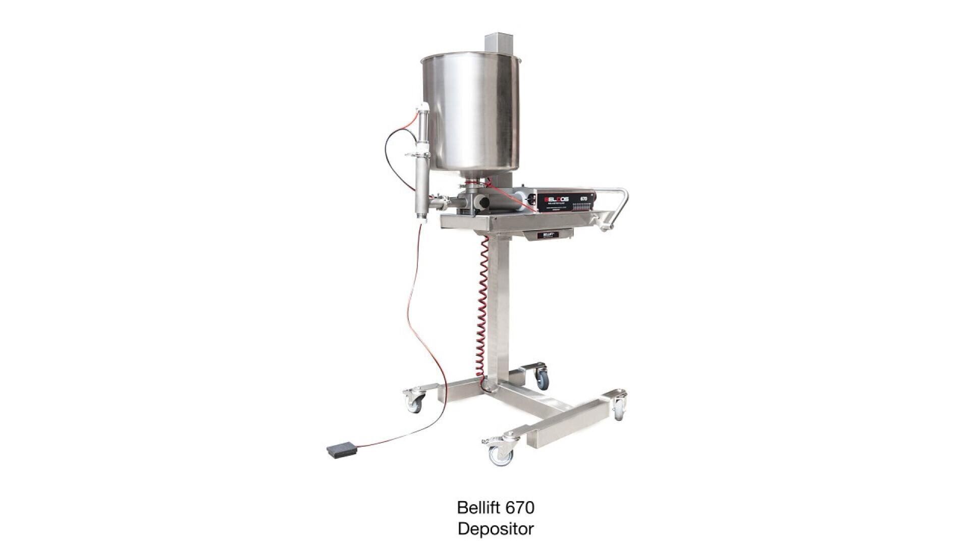 A stainless steel Bellift 670 Depositor machine on wheels, featuring a large cylindrical hopper, control panel, attached cables, and a foot pedal, designed for food or product dispensing.