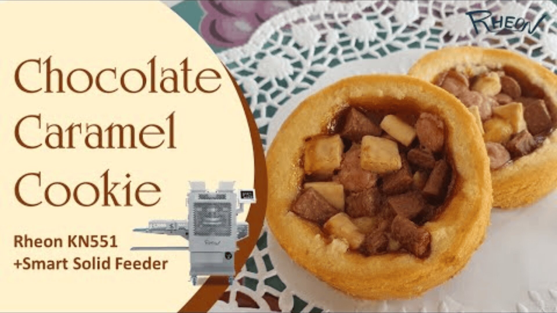 A round cookie filled with chocolate and caramel pieces is depicted on a white doily. Next to it is the text: Chocolate caramel cookie, Rheon KN551 + Smart Solid Feeder, with an image of a food processing machine.